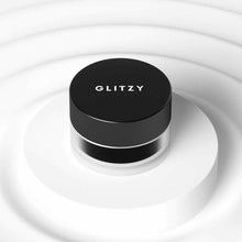 Load image into Gallery viewer, Vegan Black Gel Eyeliner in a jar, smooth and water-resistant, on a white base.