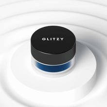 Load image into Gallery viewer, Navy Gel Eyeliner in a round pot on a white platform, vegan and cruelty-free.